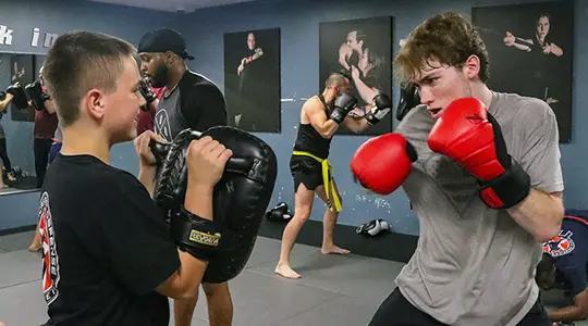 Teens practicing martial arts